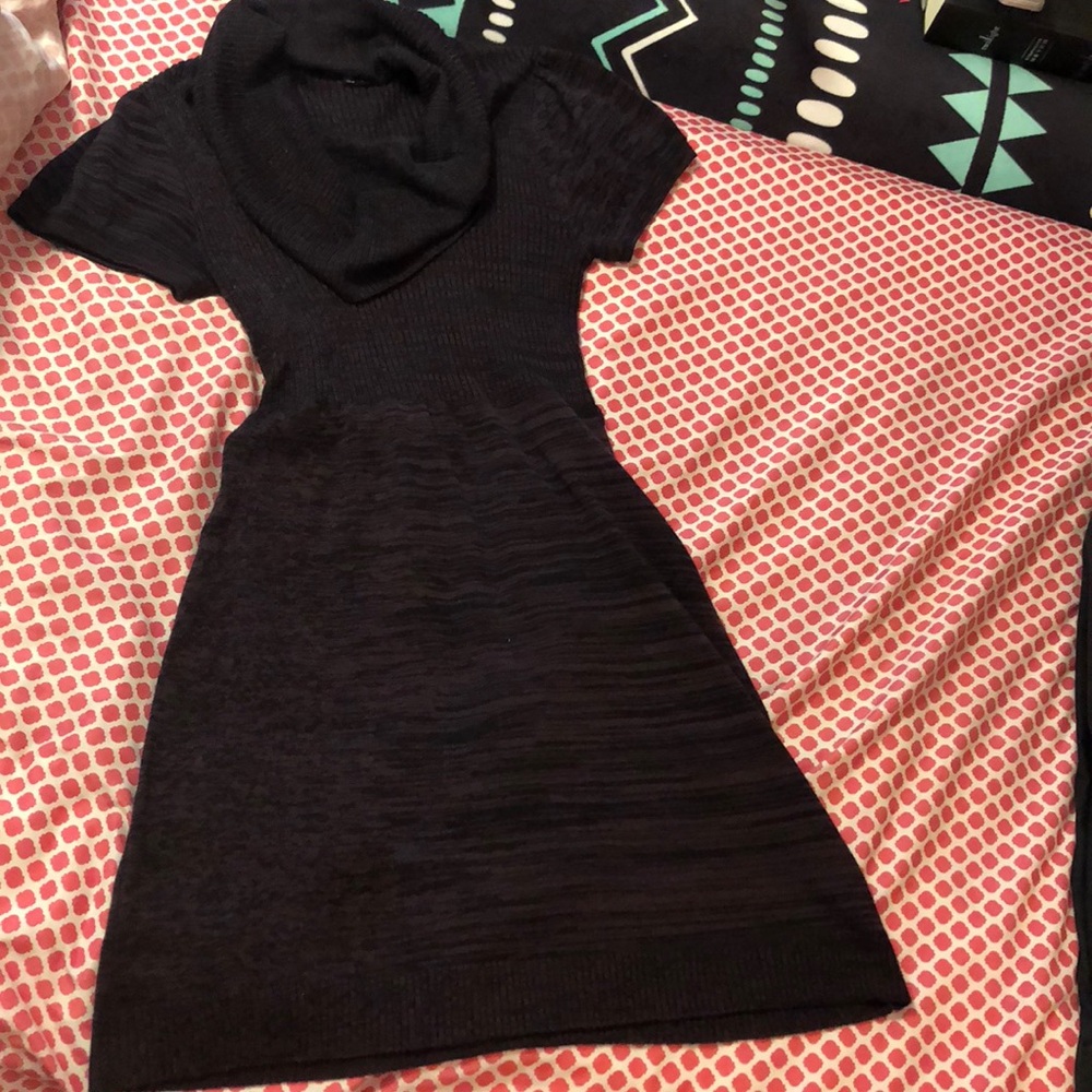 A black and purple fitted wither dress.